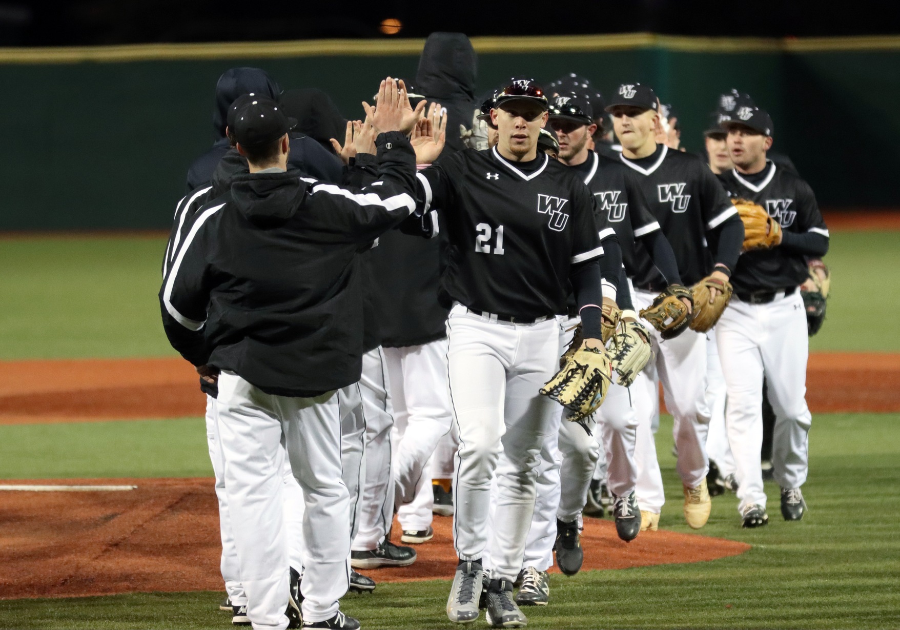 Photo following the 9-4 victory versus Stonehill. Copyright 2020; Wilmington University. All rights reserved. Photo by Dan Lauletta. February 21, 2020 vs. Stonehill at Myrtle Beach.