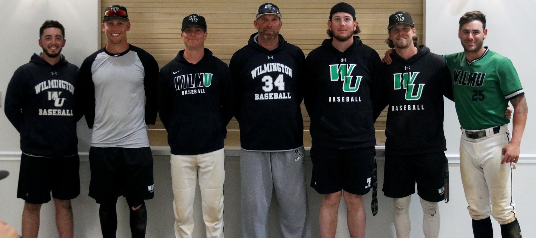 Photo of the 2022 Senior Class following the games against Goldey-Beacom: Justin Brooks, Quintin Ivy, Tyler Campbell, head coach Brian August, AJ Stento, Ryan Sandberg, and John Mead.