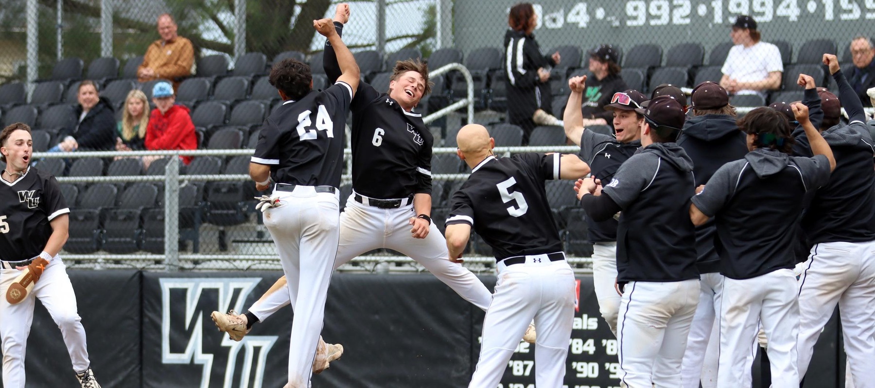 Photo of Tyler Pirrung celebrating with his teammates after his home run in game one against Bloomfield. Copyright 2025; Wilmington University. All rights reserved. Photo by Dan Lauletta. April 15, 2025 vs. Bloomfield.
