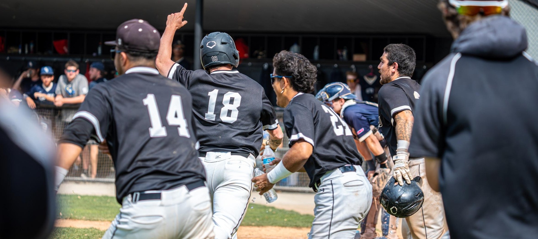 Zach Frame (18) scampers home on Zach Rosenzweig's walk-off RBI single against Goldey-Beacom. Copyright 2025; Wilmington University. All rights reserved. Photo by Giovanni Badalamenti. May 3, 2025 vs. Goldey-Beacom in CACC Tournament GM 3.