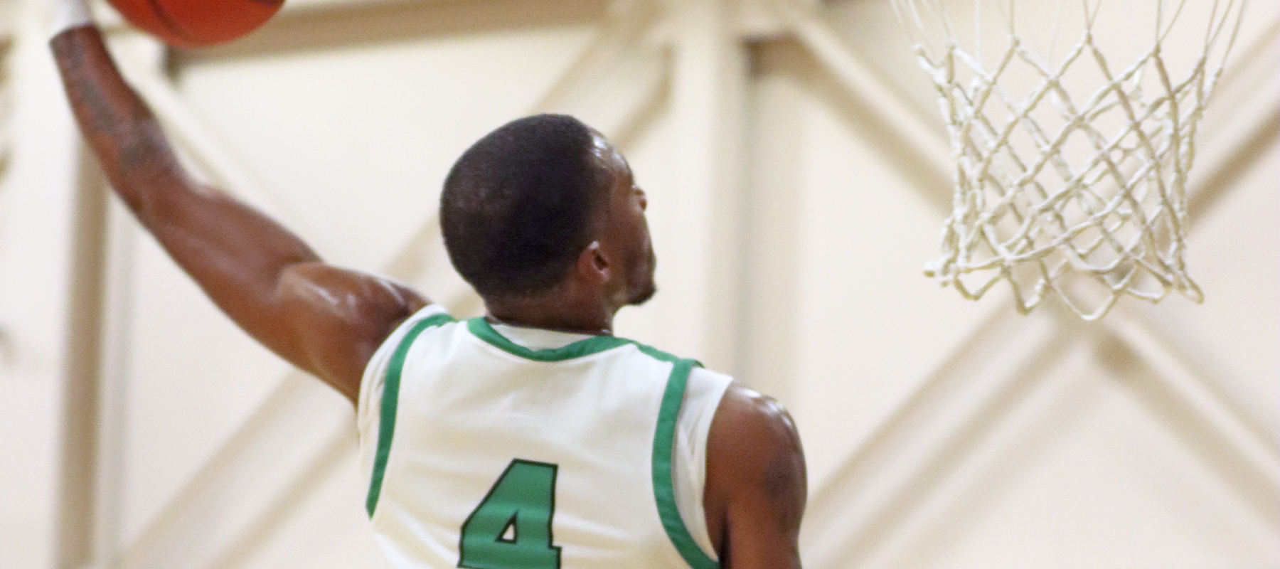 Taalib Holloman goes up for a dunk in the win against Molloy. Copyright 2023; Wilmington University. All rights reserved. Photo by Dan Lauletta. November 22, 2023 vs. Molloy.