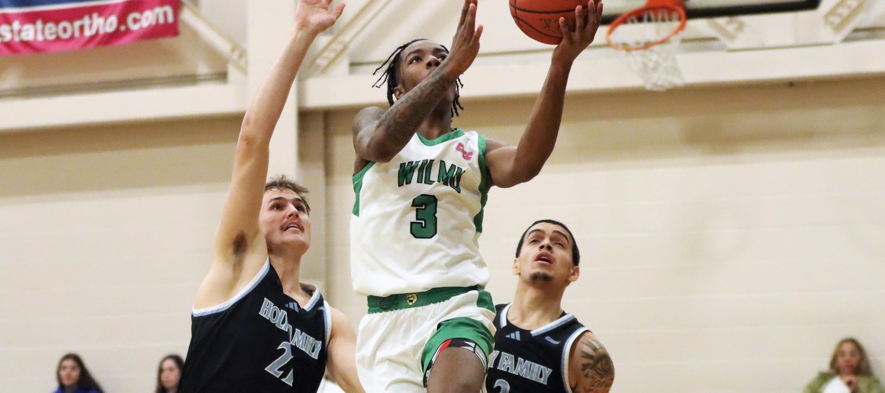 Photo of Jaylin Horsey driving to the basket for two of his game-high 19 points in the win over Holy Family. Copyright 2026; Wilmington University. All rights reserved. Photo by Dan Lauletta. February 17, 2026 vs. Holy Family.