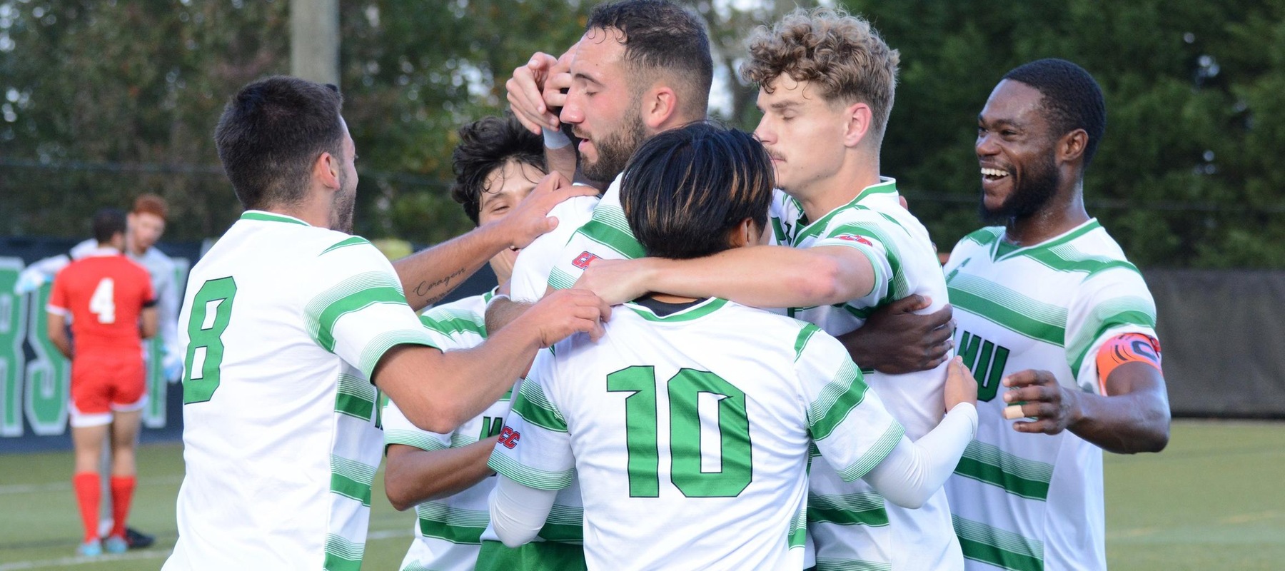 Wilmington University&rsquo;s team celebrates after Troy Paul #11 scored the first goal against Chestnut Hill University during their NCAA Men&rsquo;s soccer match at the Wilmington University Sports complex in Newark, Delaware October 18, 2023. Photo by Debra Breister.