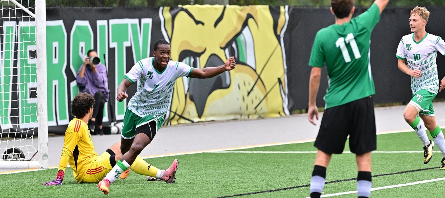 Wilmington University&rsquo;s Jhamaleek Porter (7) celebrates after scoring against Felician University&rsquo;s Emanuele Moretti (1) during their NCAA Men&rsquo;s soccer match at the Wilmington University Sports complex in Newark, Delaware, September 28, 2024 . Photo By David Reeder.