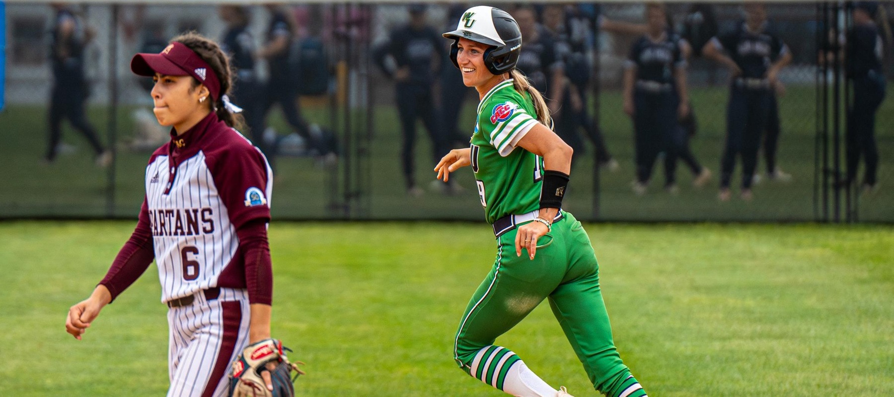 Photo of Taylor Gillis rounding the bases after her walk-off three-run homer against St. Thomas Aquinas. Copyright 2024; Wilmington University. All rights reserved. Photo by Giovanni Badalamenti. May 9, 2024 vs. St. Thomas Aquinas.