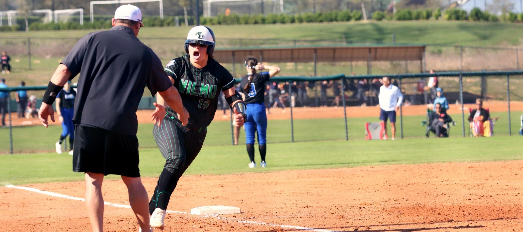 Photo of Bella Barnes rounding third after her home run against Grand Valley State on Sunday. Copyright 2025; Wilmington University. All rights reserved. Photo by Erin Harvey. March 2, 2025 vs. Grand Valley State.