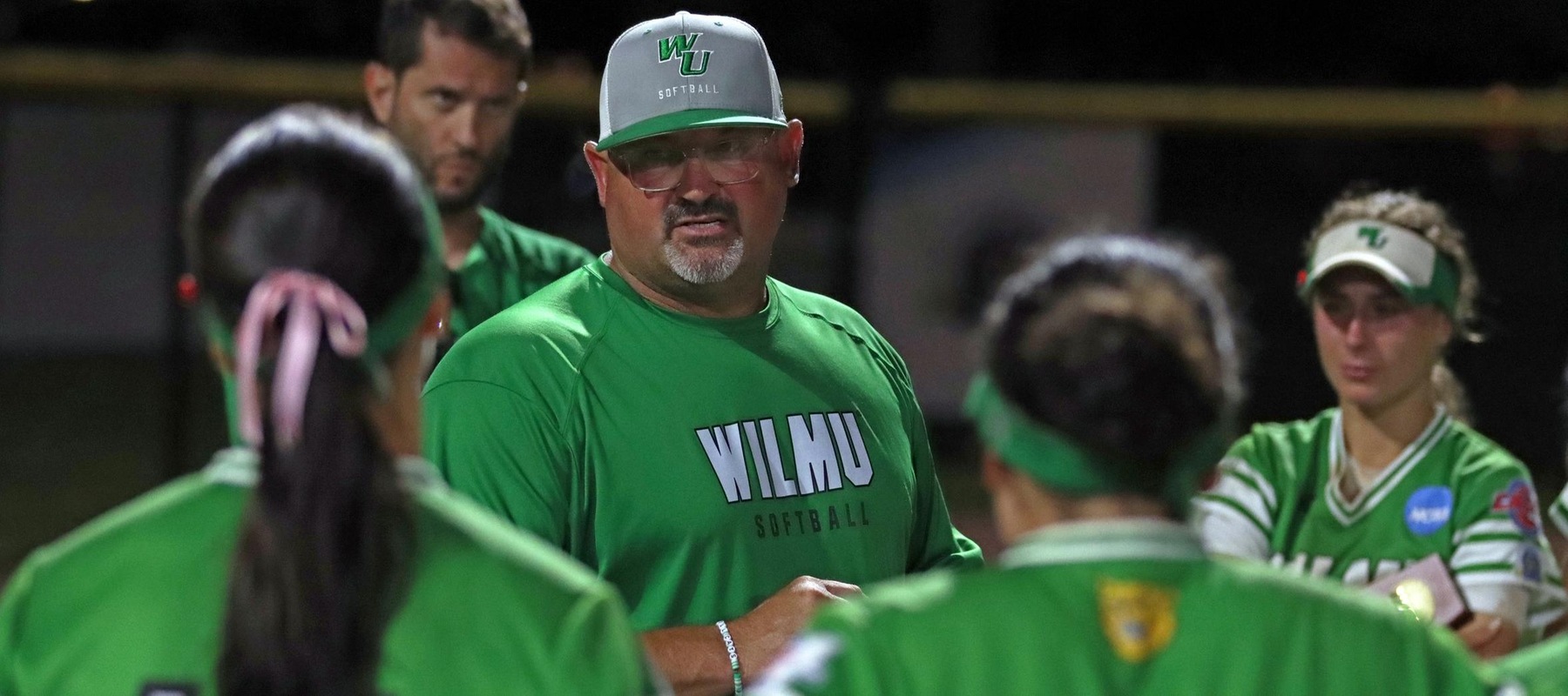 Mike Shehorn talks to his team following a game at the 2024 NCAA DII Softball Championships in Longwood, Florida.