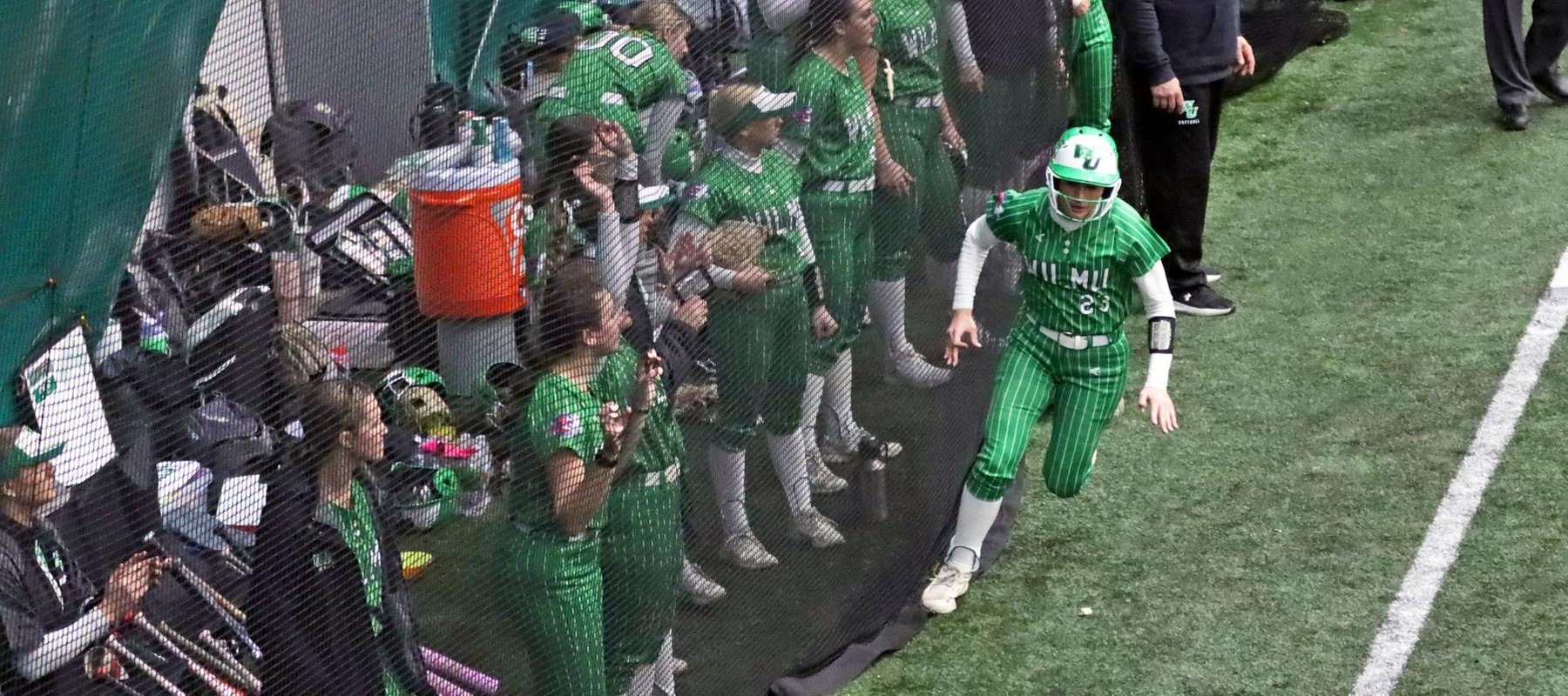 Photo of Mia Lane scoring on a Jess Reed single in the top of the first inning og agme two on Friday. Copyright 2026; Wilmington University. All rights reserved. Photo by Dan Lauletta. February 13, 2026 vs. Lock Haven at The Dome.