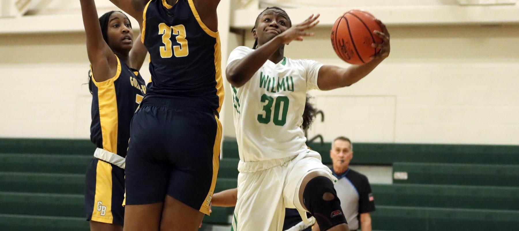 Photo of Emily Ansah scoring two of her team high 12 points against Goldey-Beacom. Copyright 2022; Wilmington University. All rights reserved. Photo by Dan Lauletta.