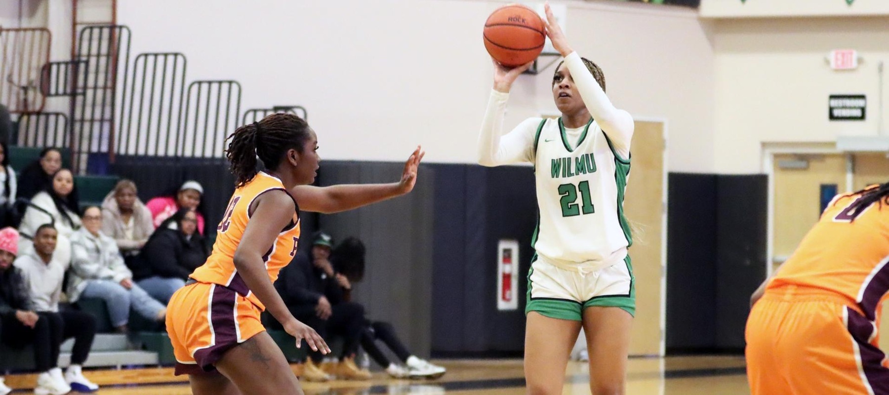 Photo of Aniyah Bond shooting a three-pointer against Post. Copyright 2025; Wilmington University. All rights reserved. Photo by Dan Lauletta. February 1, 2025 vs. Post.