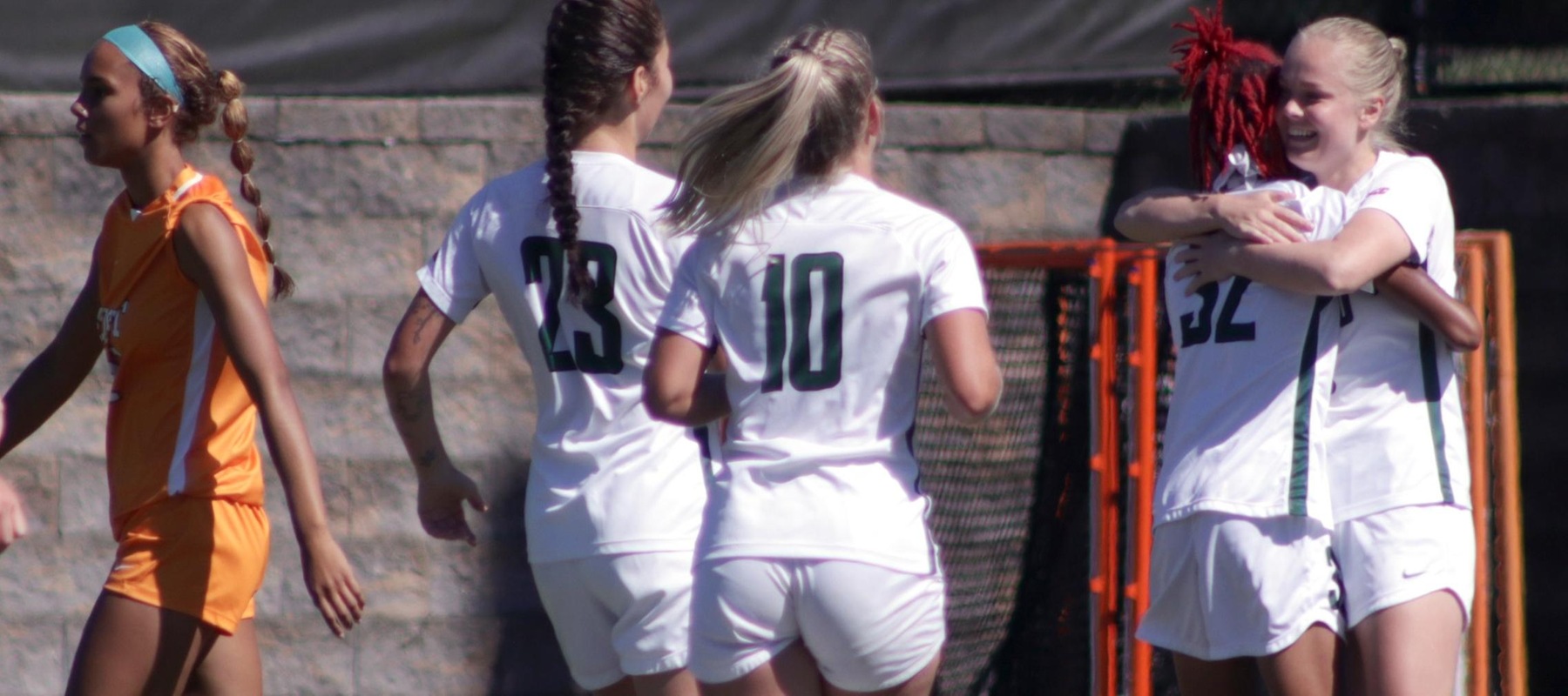 Wilmington University's Emilie Larsen (18) celebrates a goal with (10) (23) and (32) against Post University during their NCAA womens soccer match at the Wilmington University sports complex in Newark, Delaware, September 21, 2022. Photo by Victor Molina